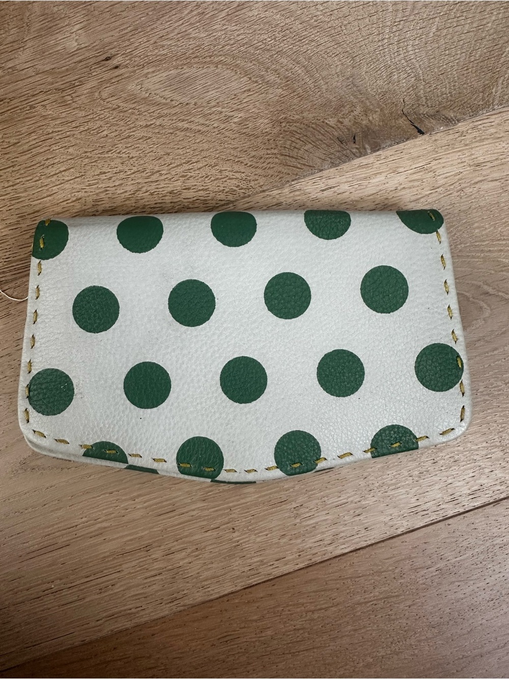 Holding Horses cream leather Clutch Wallet with Green Polka Dots